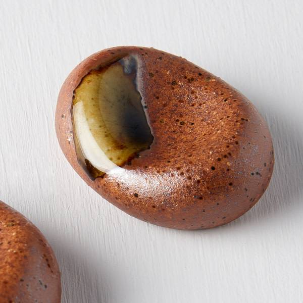 Brown with green splash chopstick pebble rest