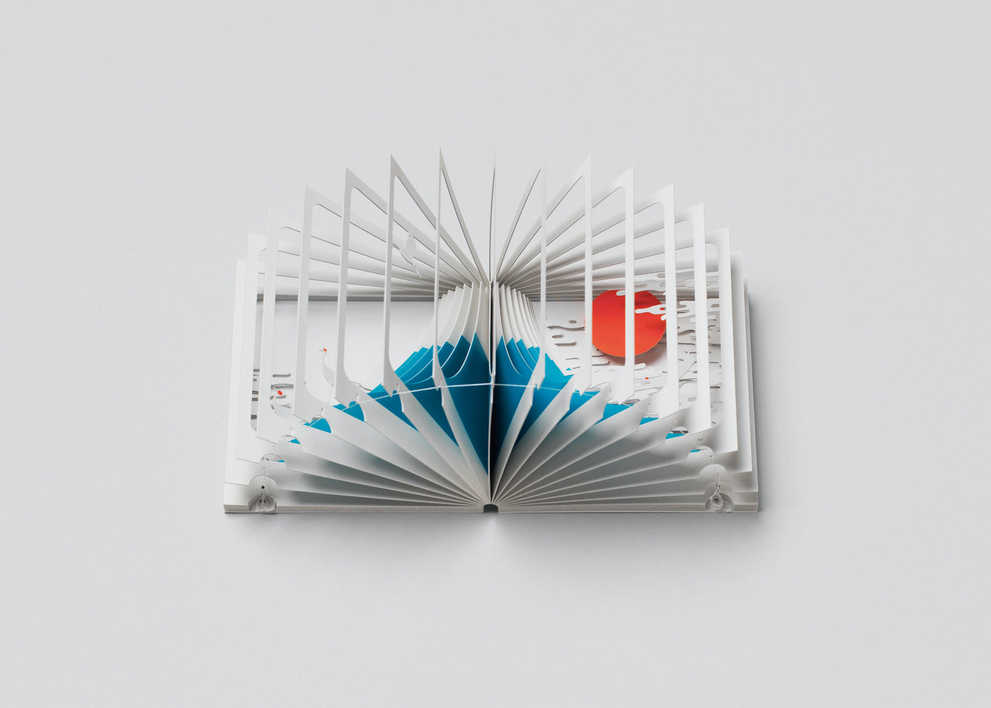 Open book with geometric design on a white background
