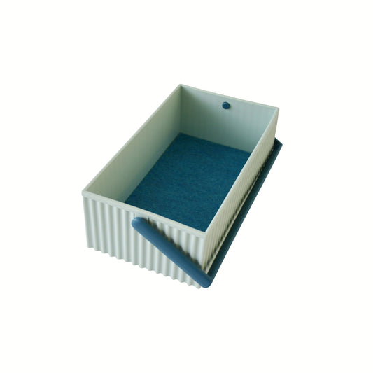 Rectangular container with a blue interior and handle on a white background