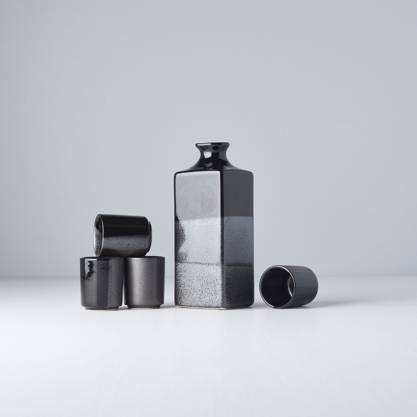 Gunmetal and black jug & 4 cups sake set