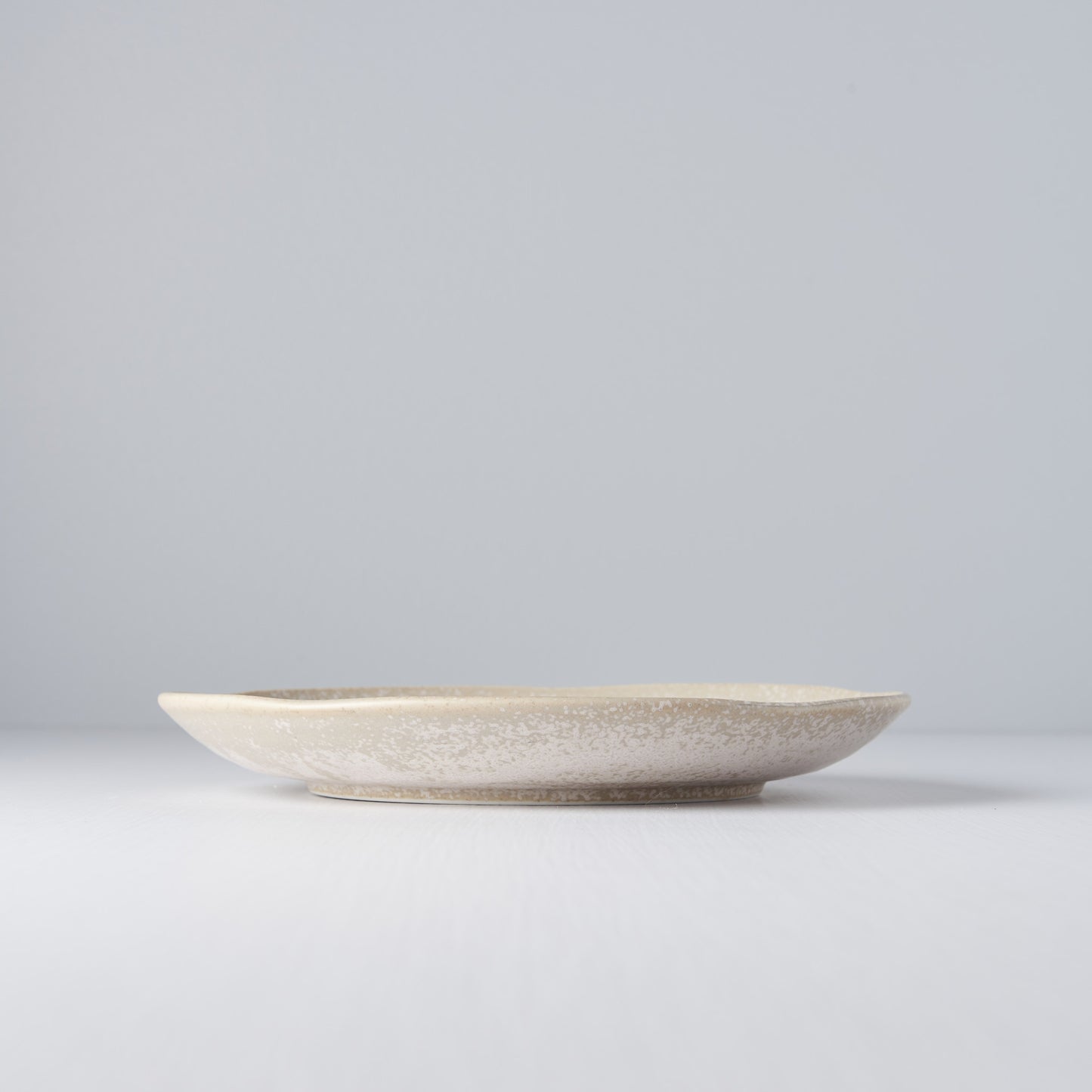 White Fade uneven plate 24cm